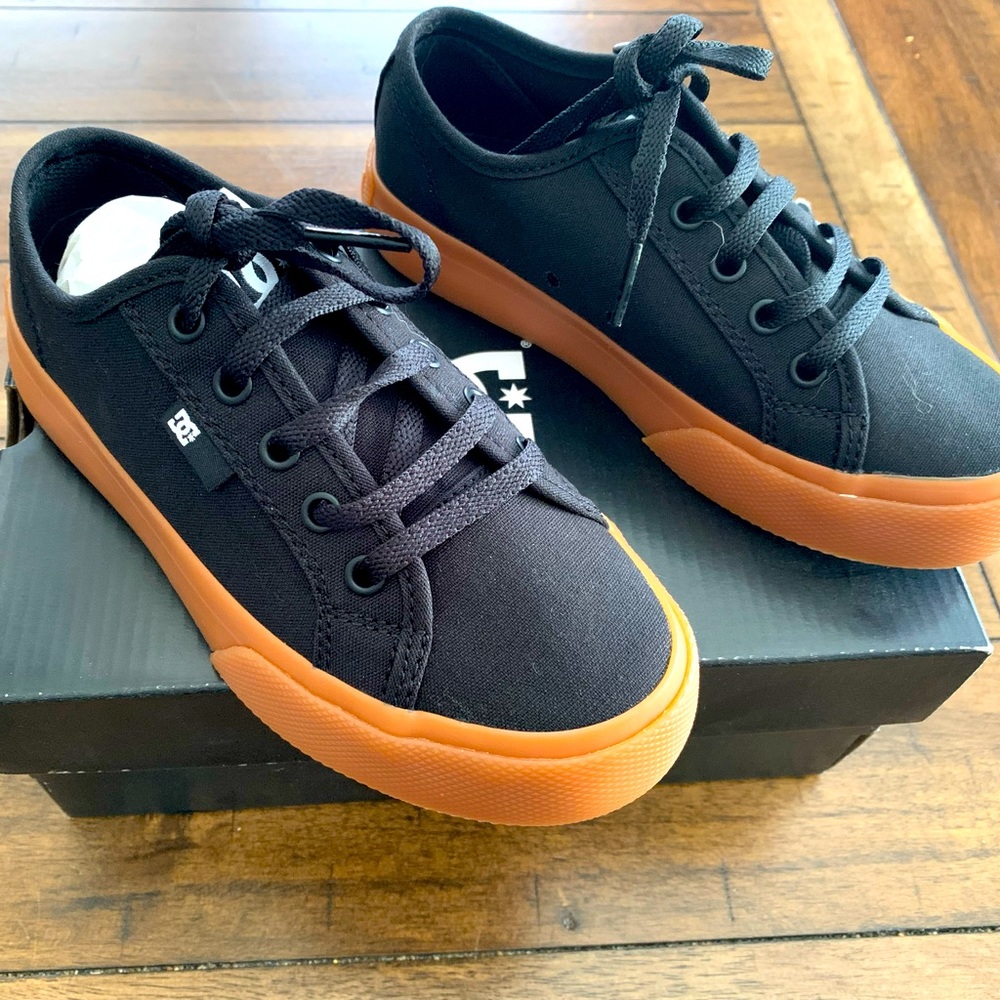 Brand new, never worn kid’s size 1.5 DC Manual Skate shoes